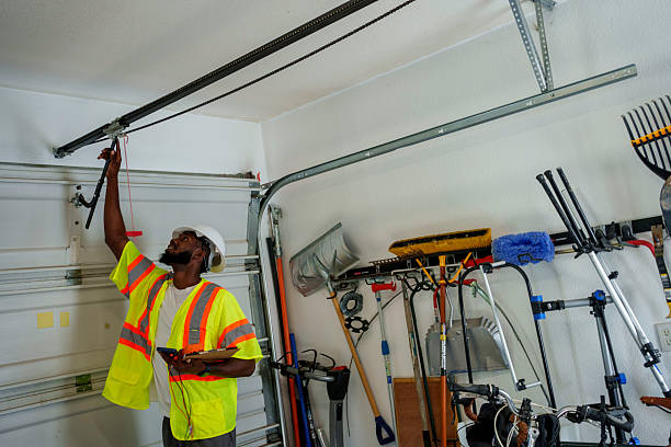 Professional Garage Door Panel Replacement technician working in Pope County County, AR